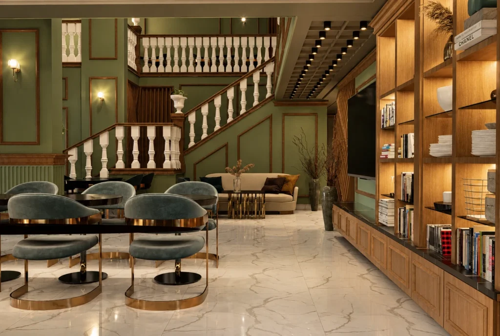 Salon avec escalier et bibliothèque — Restaurant La Durée, Kénitra — rendu 3D DECO3D.ma
